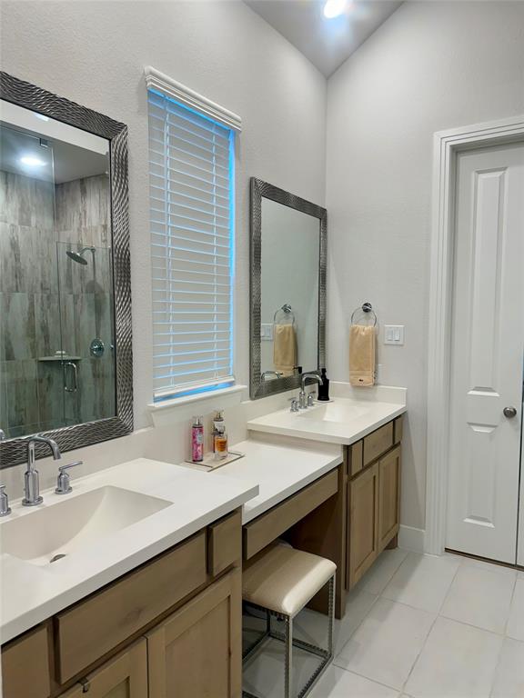 1835 Bell Court Van Alstyne, TX 75495 - Photo 12 of 20 a bathroom with a sink double vanity and a mirror