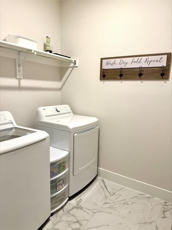 1835 Bell Court Van Alstyne, TX 75495 - Photo 17 of 20 a utility room with dryer and washer