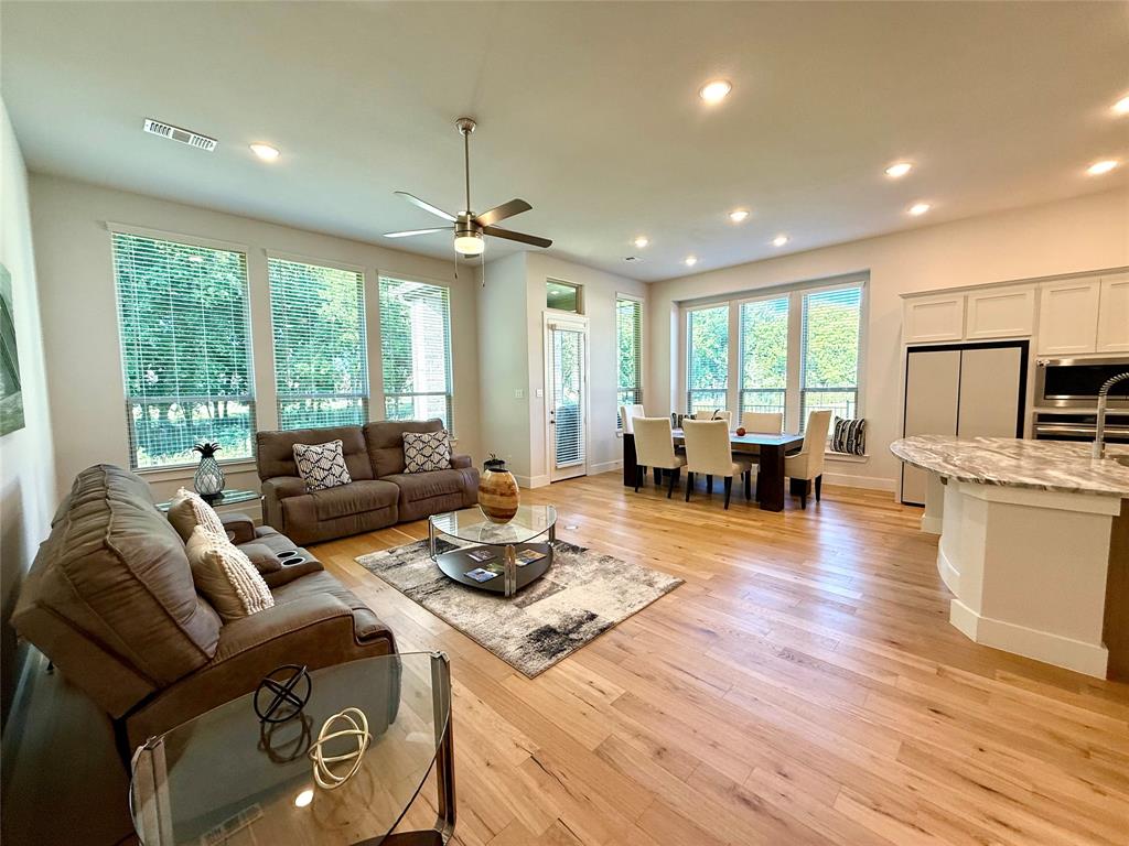 1835 Bell Court Van Alstyne, TX 75495 - Photo 3 of 20 a living room with furniture and a wooden floor