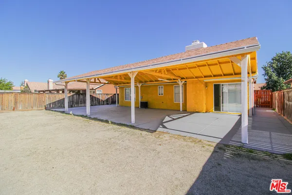 a view of house with outdoor space