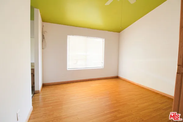 a view of an empty room and window