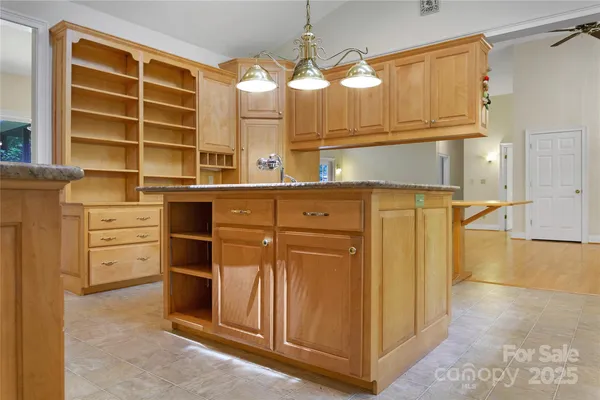 a kitchen with stainless steel appliances a stove and a refrigerator