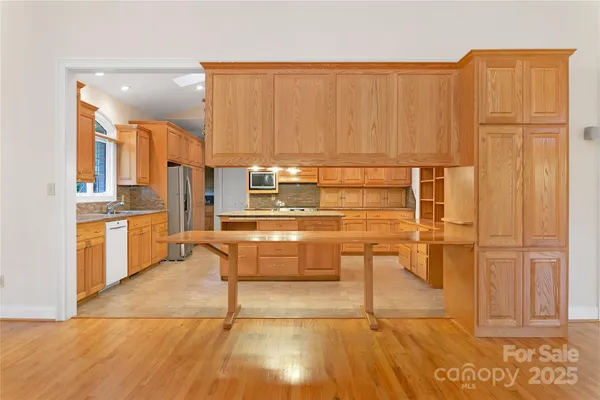 a room with view of a kitchen