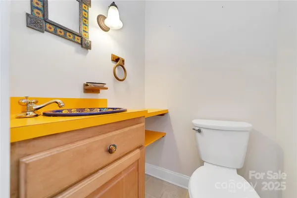 a bathroom with a toilet and a sink