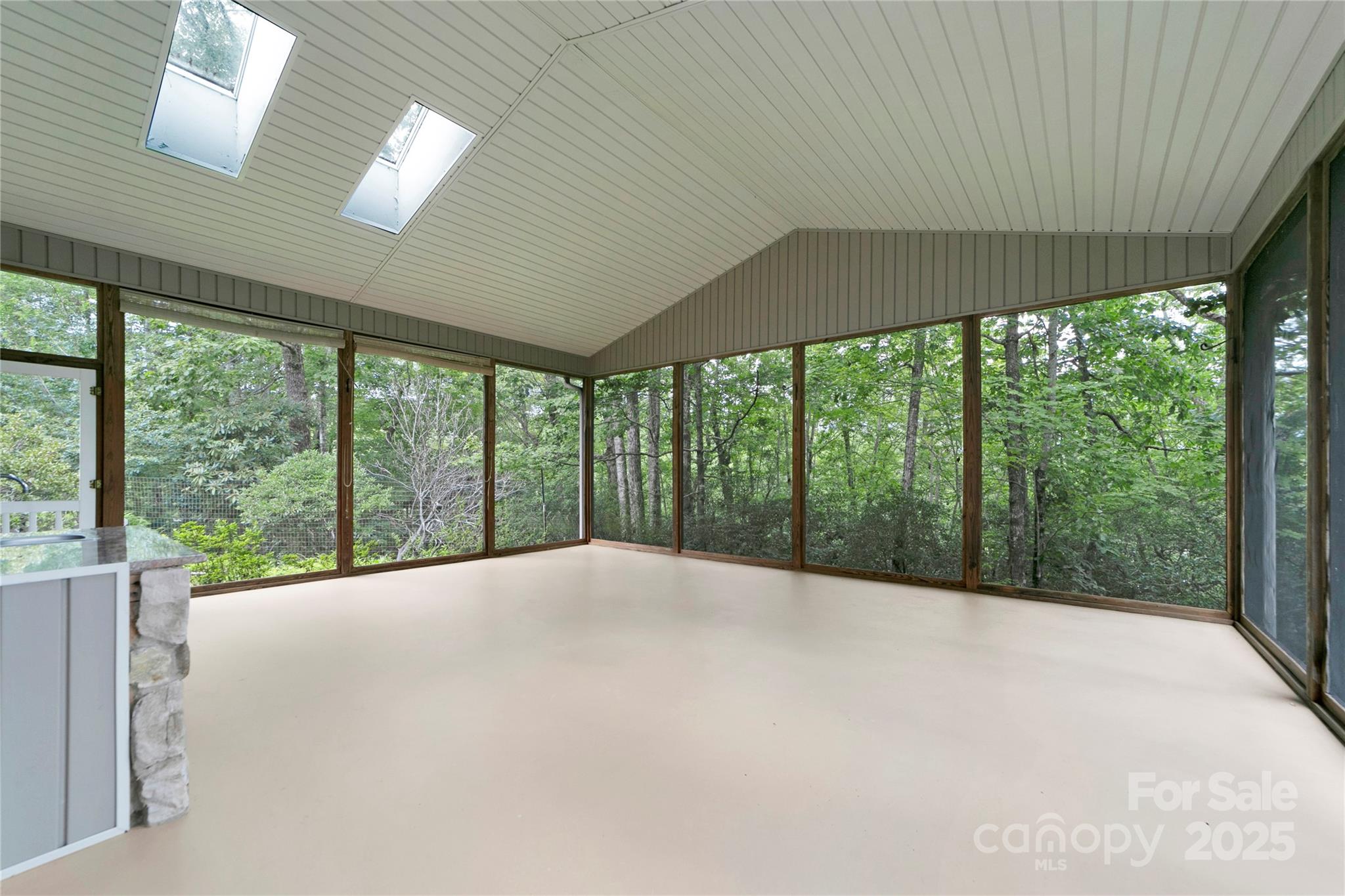 273 Inoli Circle Brevard, NC 28712 - Photo 28 of 47 a view of an empty room with a balcony