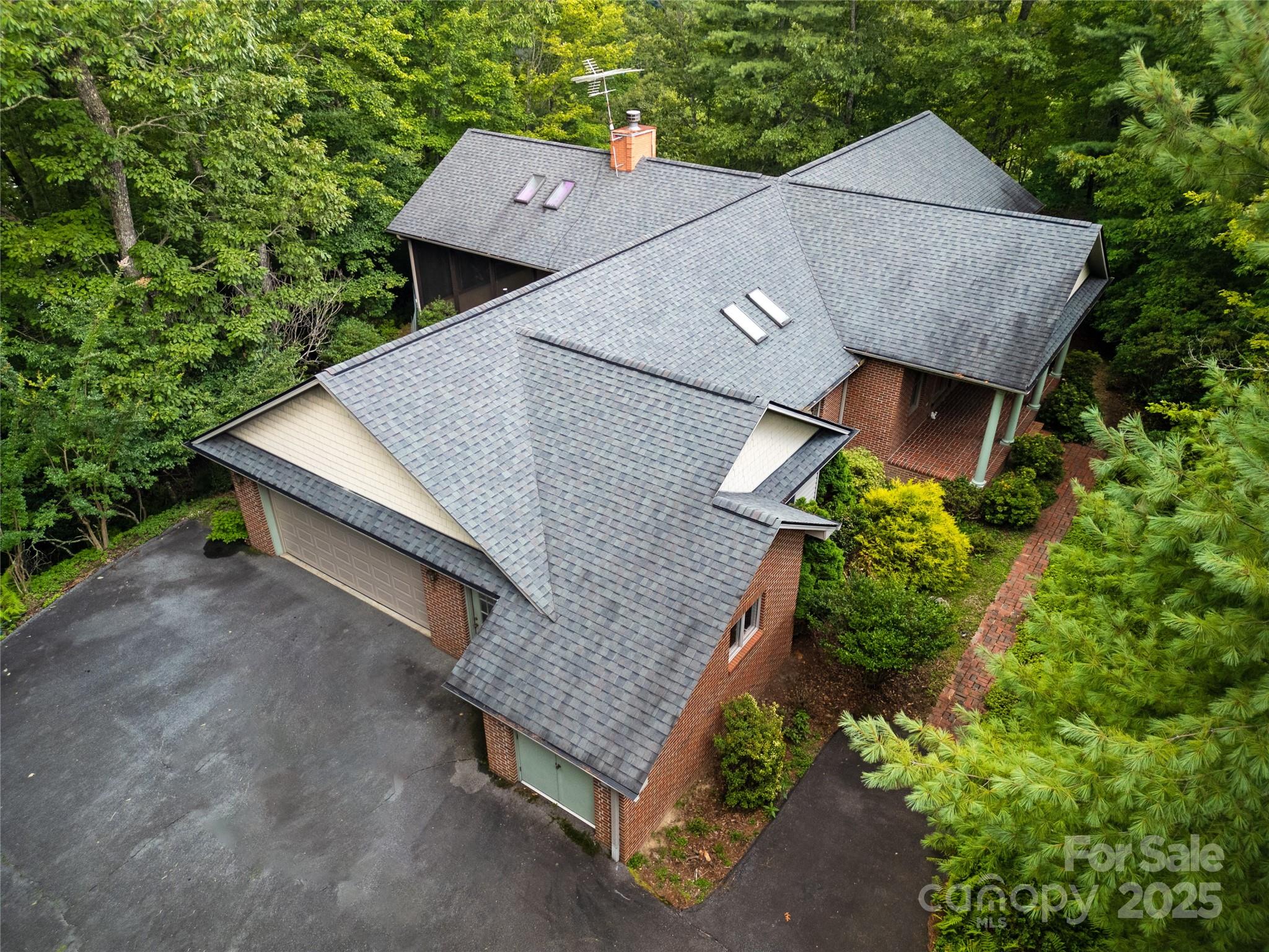 273 Inoli Circle Brevard, NC 28712 - Photo 4 of 47 an aerial view of house with yard and outdoor seating