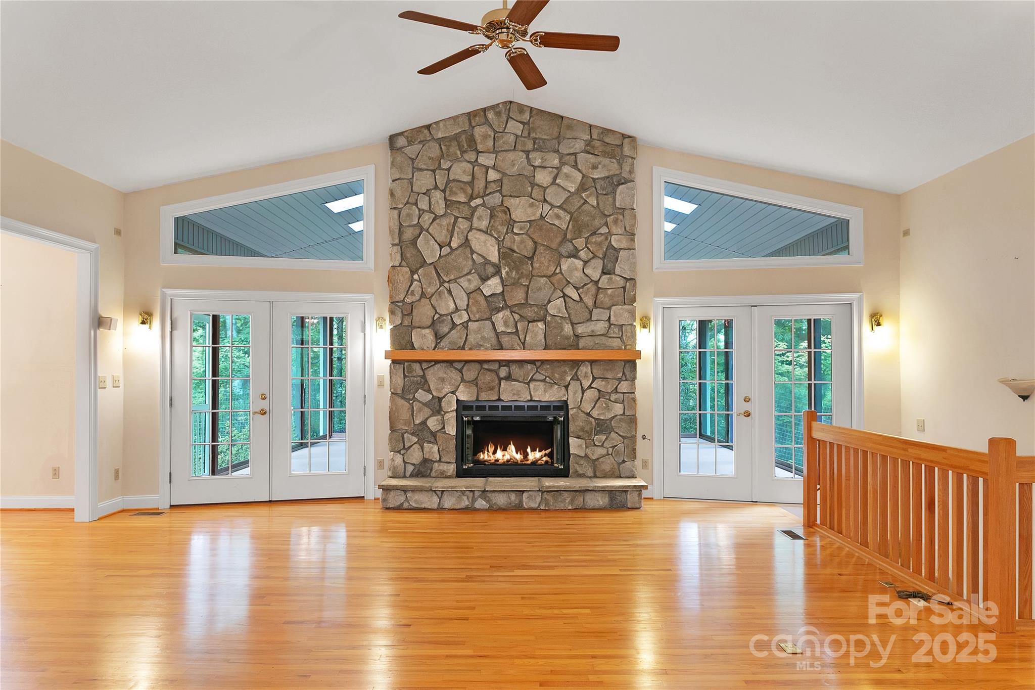 273 Inoli Circle Brevard, NC 28712 - Photo 7 of 47 a living room with a fireplace and wooden floor
