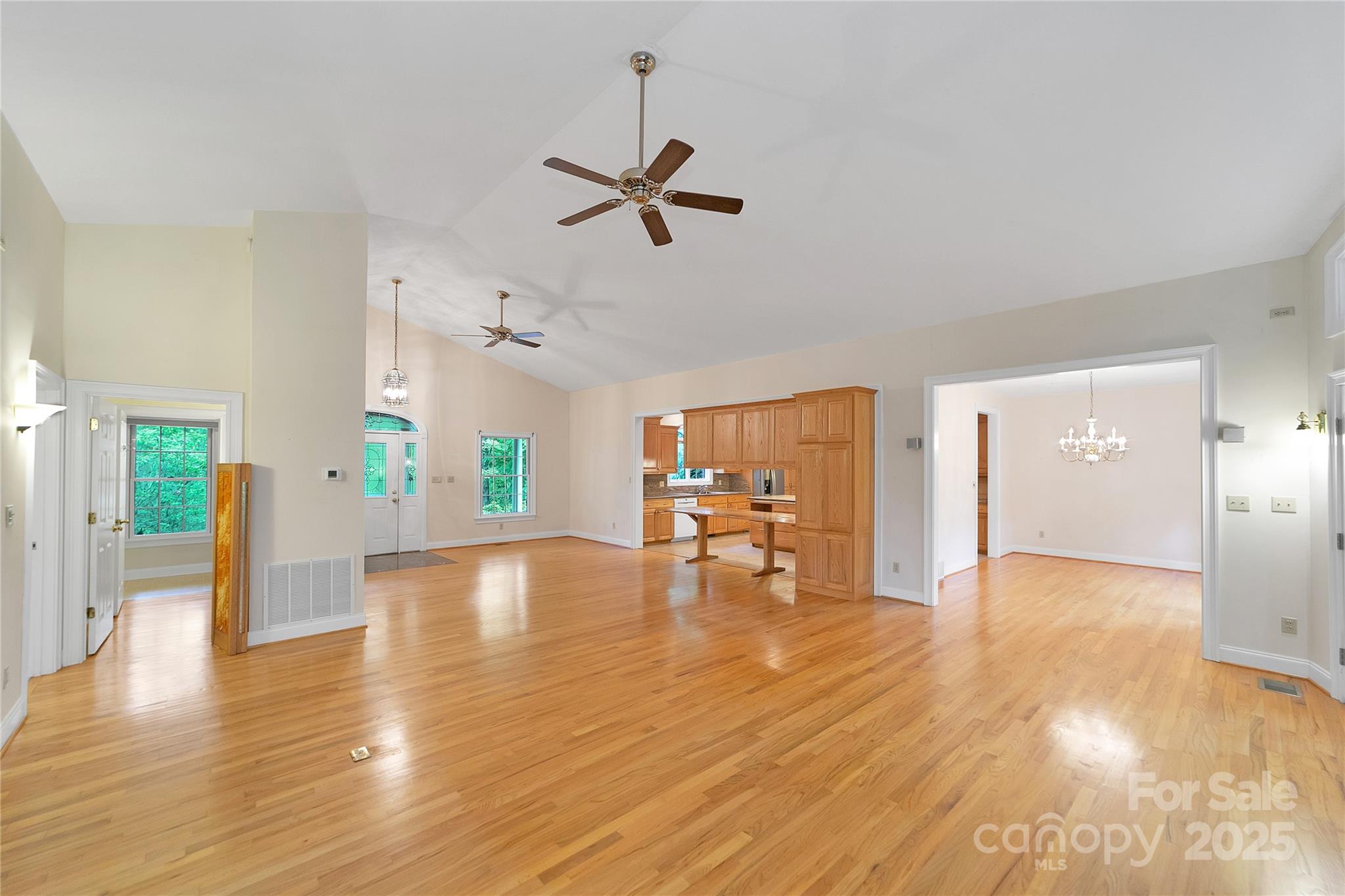 273 Inoli Circle Brevard, NC 28712 - Photo 10 of 47 a view of empty room with wooden floor and windows