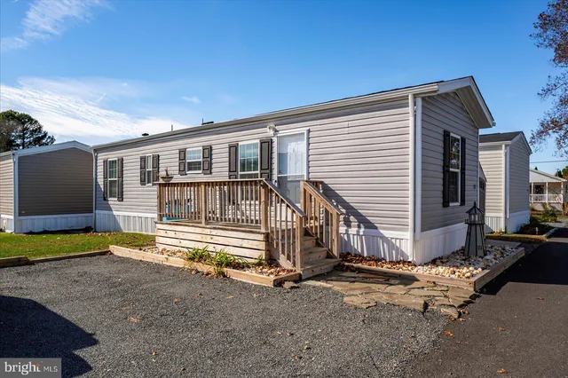 a house view with a backyard space
