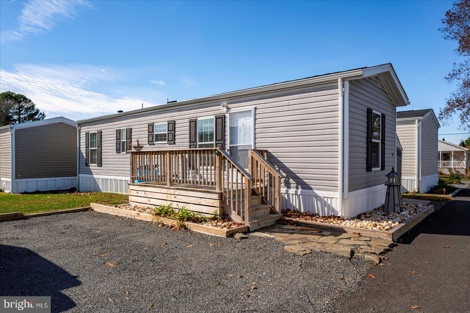 a house view with a backyard space