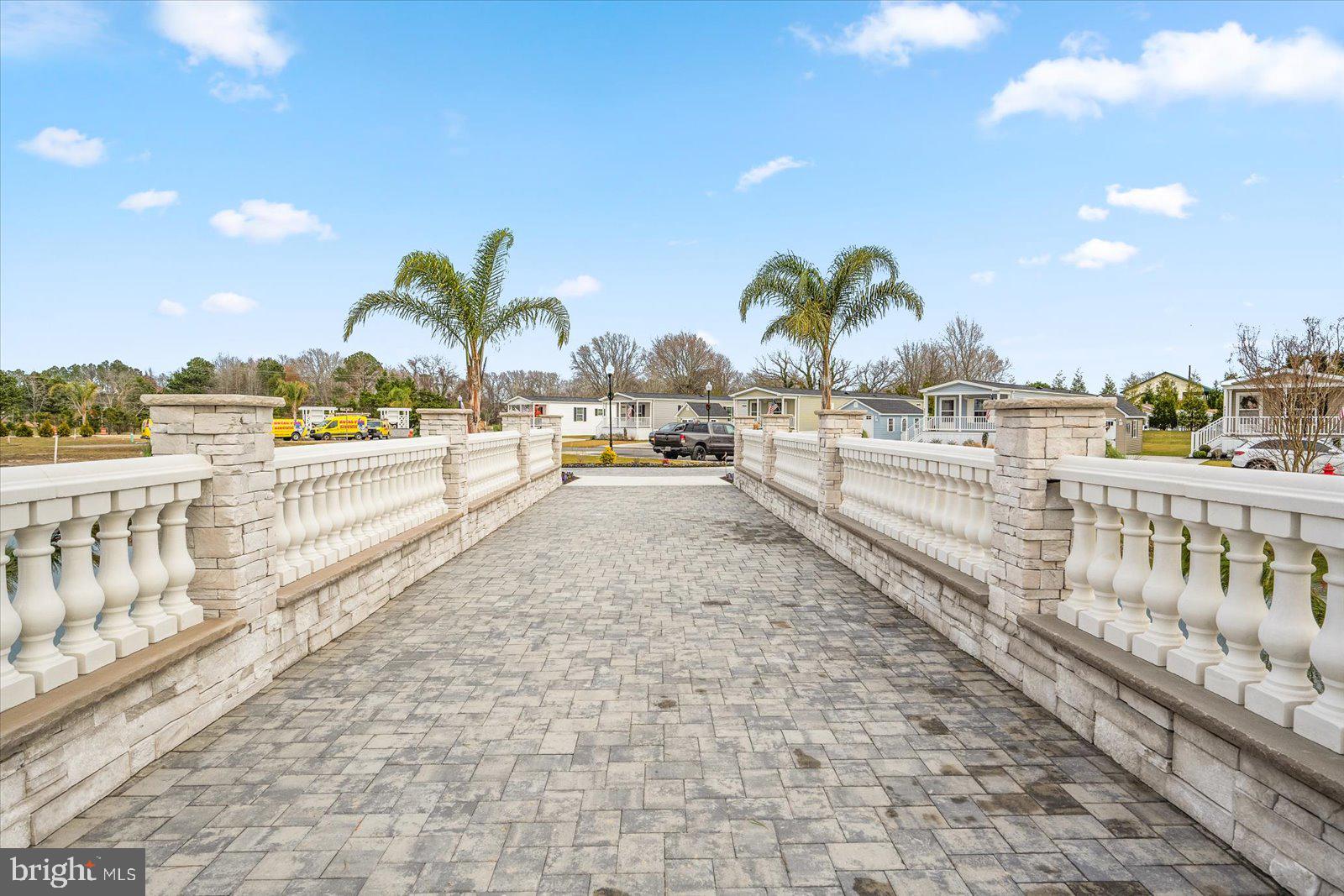 12346 Old Bridge Road, Unit 152 Ocean City, MD 21842 - Photo 38 of 55 a view of swimming pool with outdoor seating