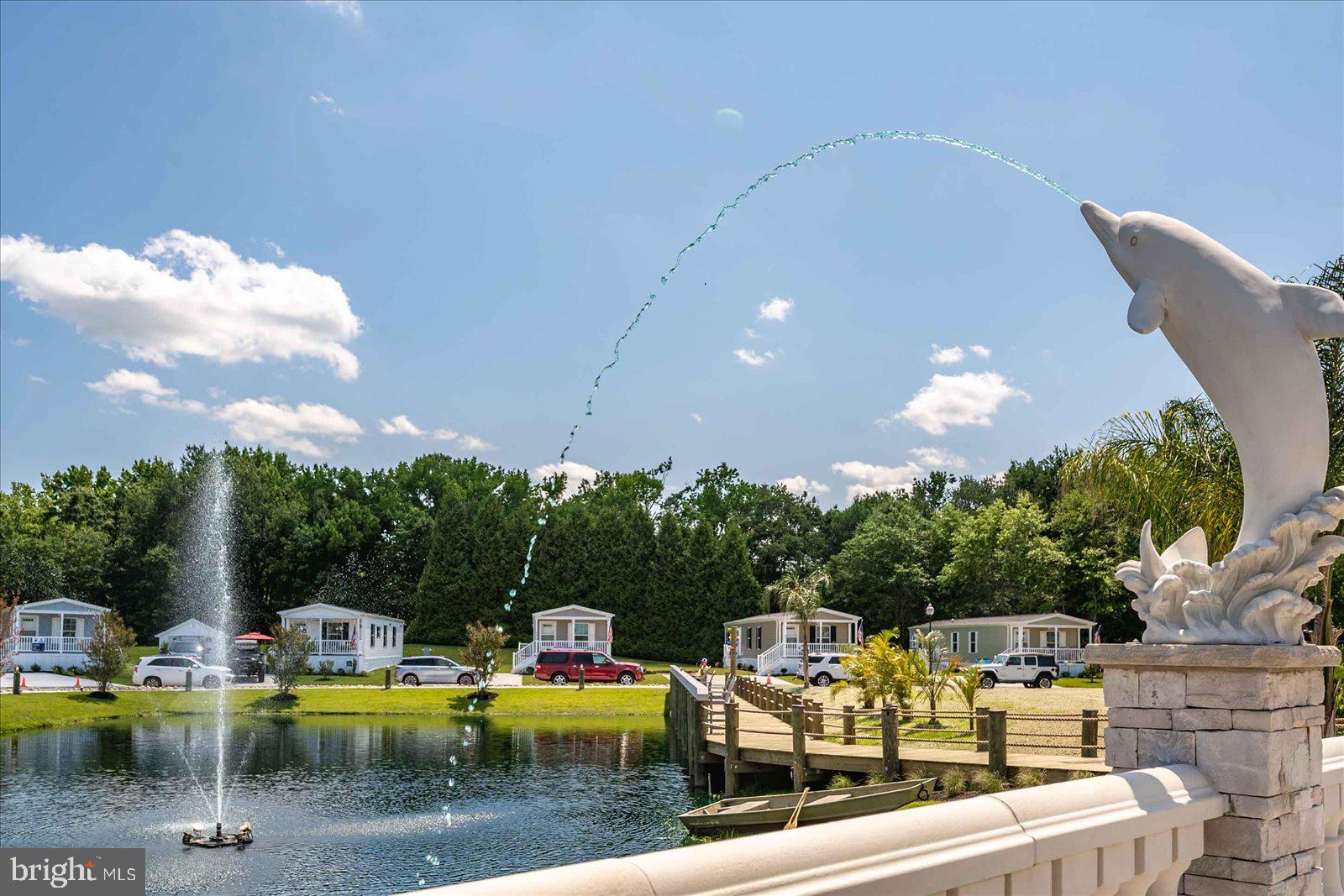 12346 Old Bridge Road, Unit 152 Ocean City, MD 21842 - Photo 41 of 55 a view of a swimming pool with lounge chairs