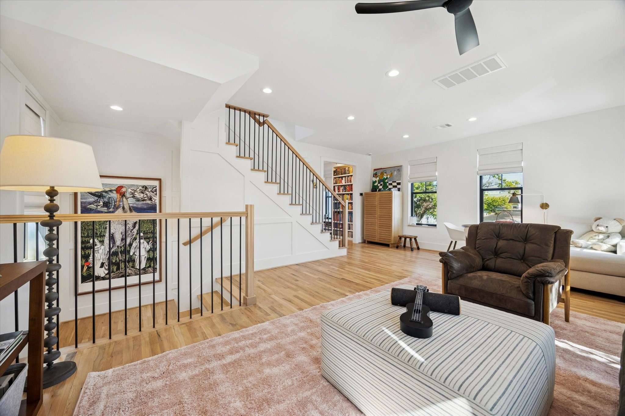 701 Ridge Street Houston, TX 77009 - Photo 22 of 50 a living room with furniture and a wooden floor