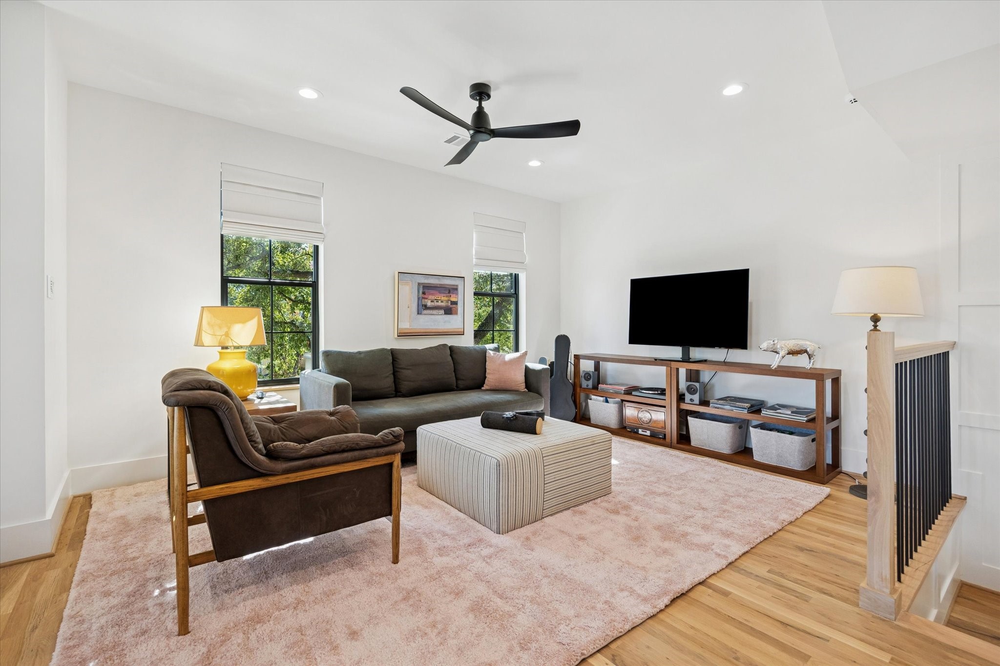 701 Ridge Street Houston, TX 77009 - Photo 23 of 50 a living room with furniture and a flat screen tv