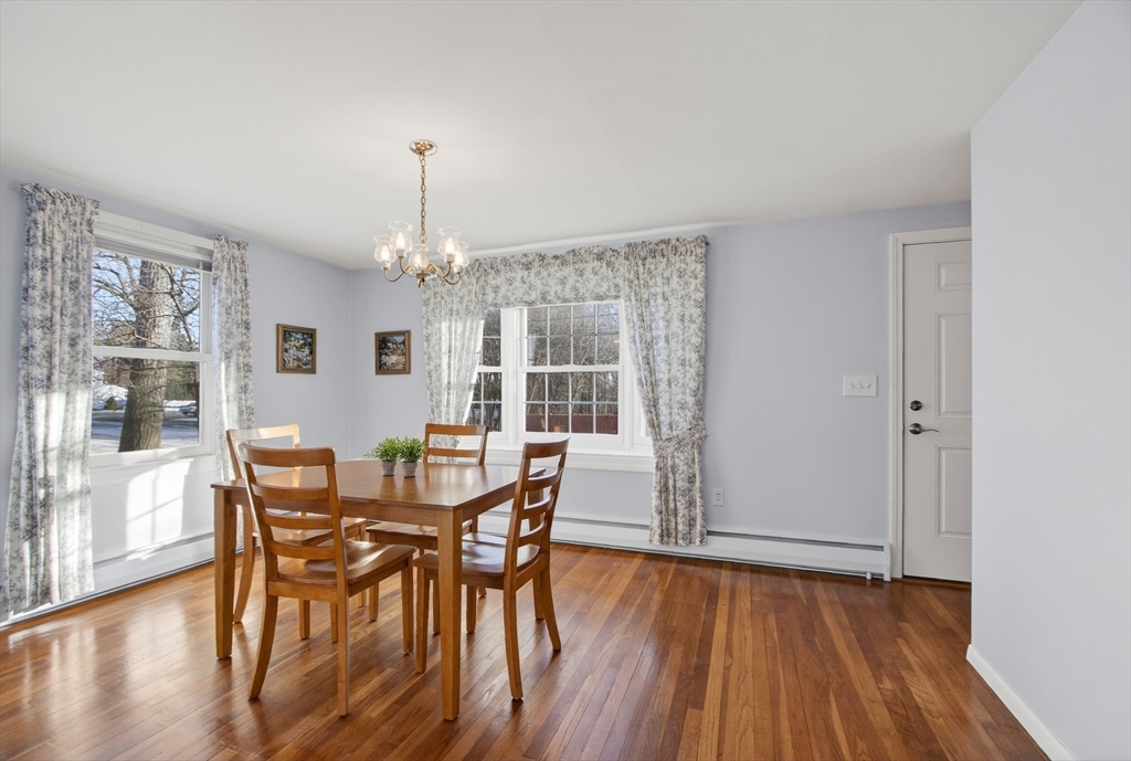 12 Patricia Road Peabody, MA 01960 - Photo 11 of 42 a view of a dining room with furniture window and wooden floor