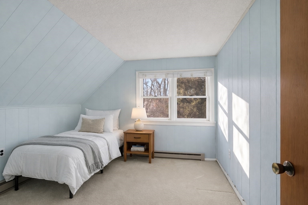 12 Patricia Road Peabody, MA 01960 - Photo 27 of 42 a bedroom with a bed and a window