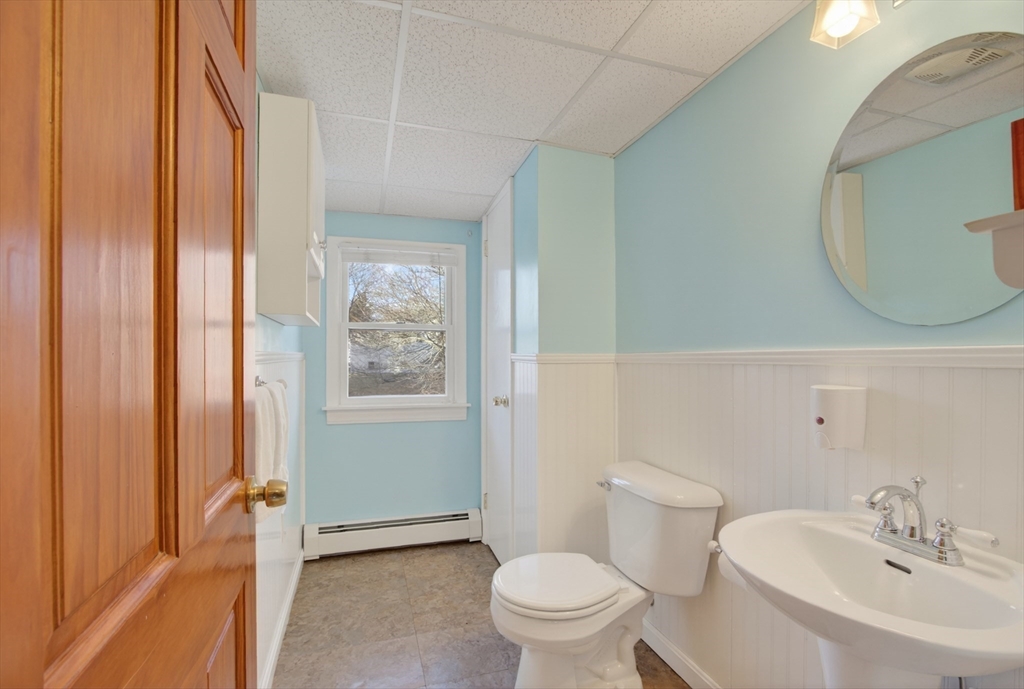 12 Patricia Road Peabody, MA 01960 - Photo 30 of 42 a bathroom with a sink and a mirror