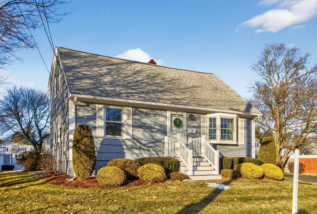 12 Patricia Road Peabody, MA 01960 - Photo 3 of 42 a view of a building with snow on the road