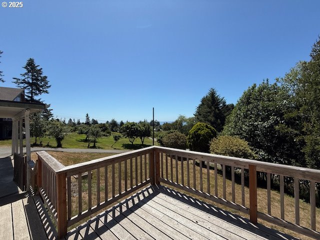 97923 Payne Road Brookings, OR 97415 - Photo 2 of 42 a view of deck with furniture and trees