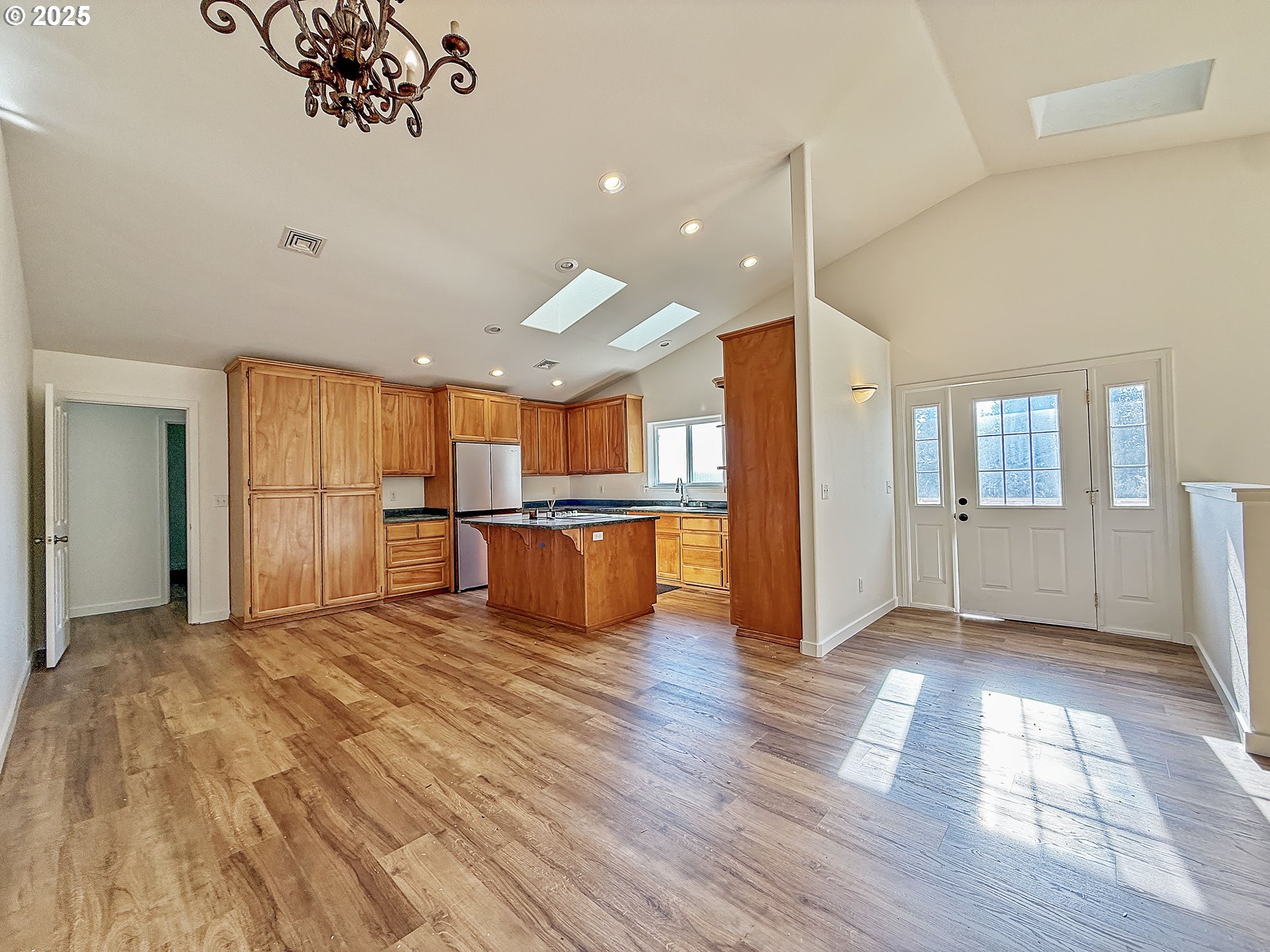 97923 Payne Road Brookings, OR 97415 - Photo 34 of 42 a view of a kitchen with wooden floor and a kitchen