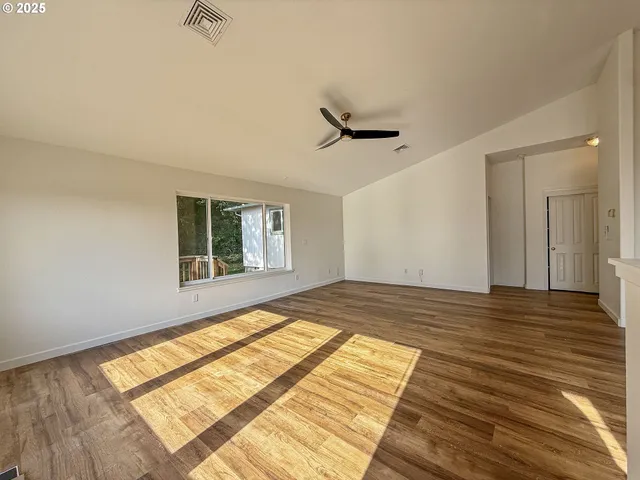 a view of an empty room and window