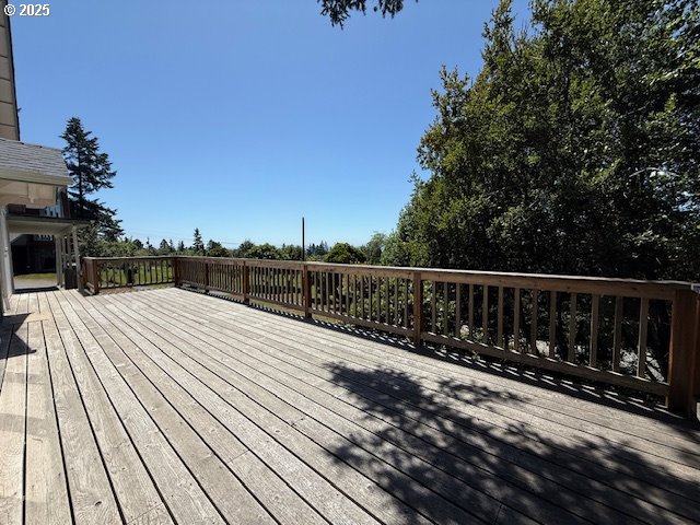 97923 Payne Road Brookings, OR 97415 - Photo 7 of 42 a view of balcony with wooden floor and fence
