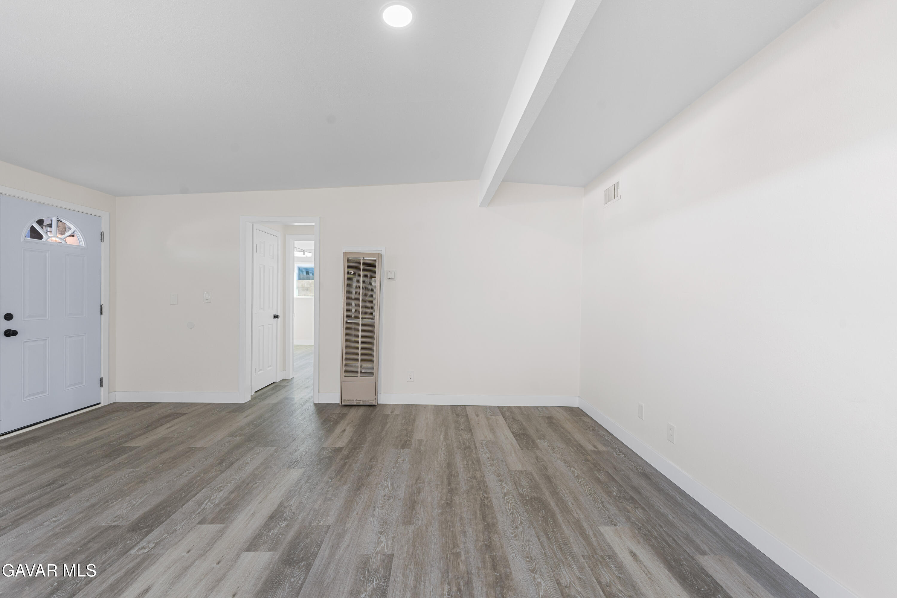 44745 3rd Street East Lancaster, CA 93535 - Photo 18 of 30 a view of a room with wooden floor