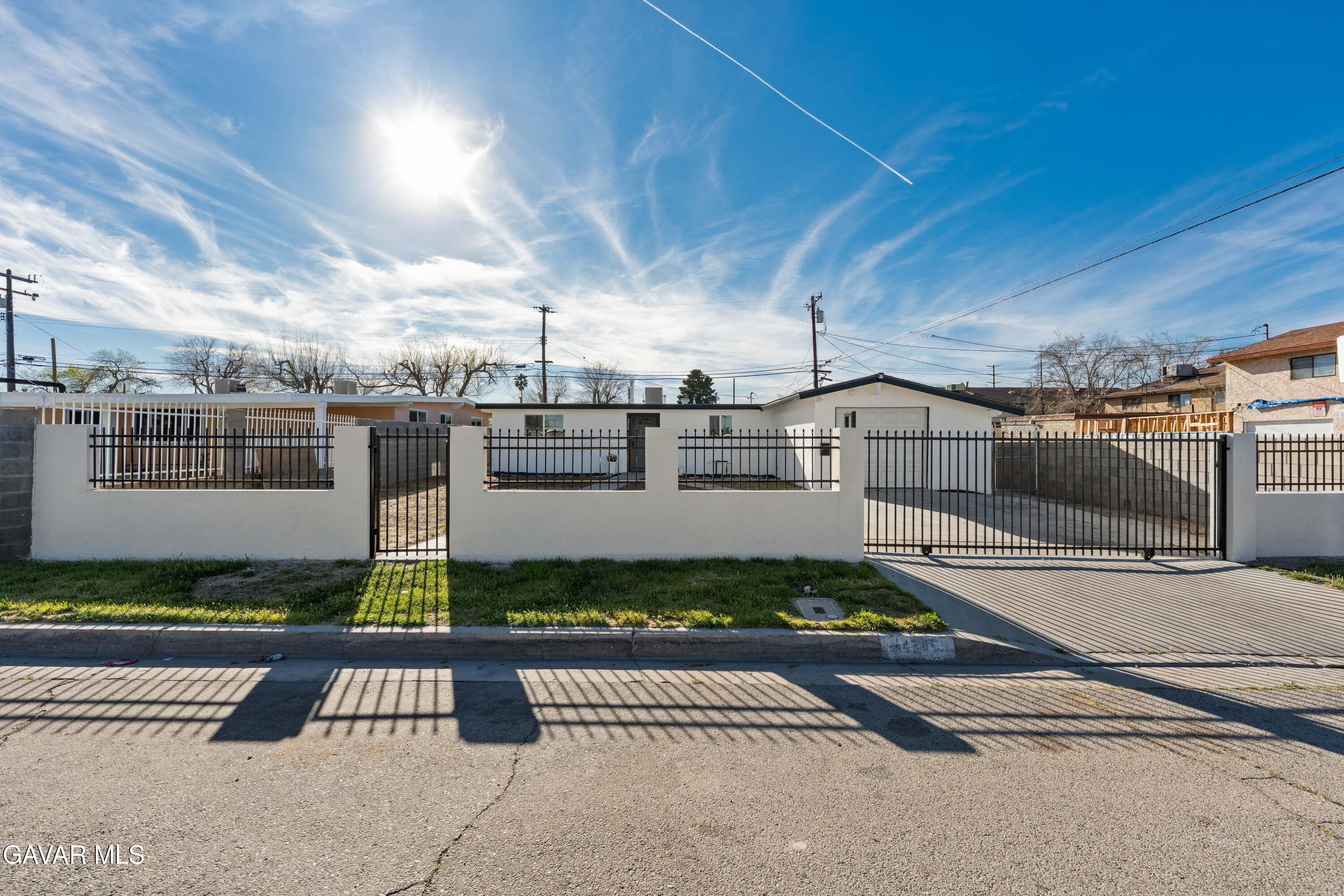 44745 3rd Street East Lancaster, CA 93535 - Photo 30 of 30 a view of a street with sitting area