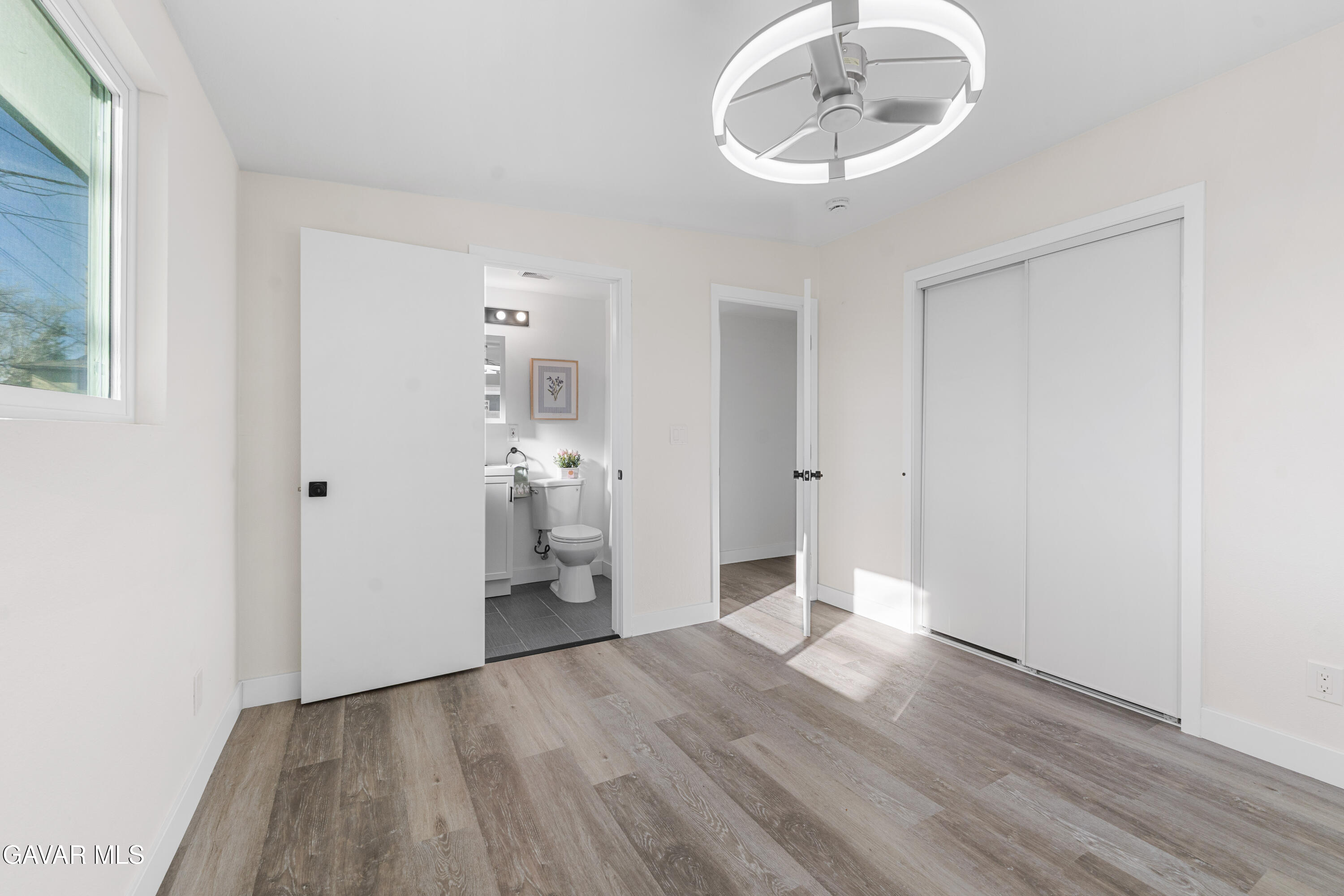 44745 3rd Street East Lancaster, CA 93535 - Photo 7 of 30 a view of empty room with wooden floor