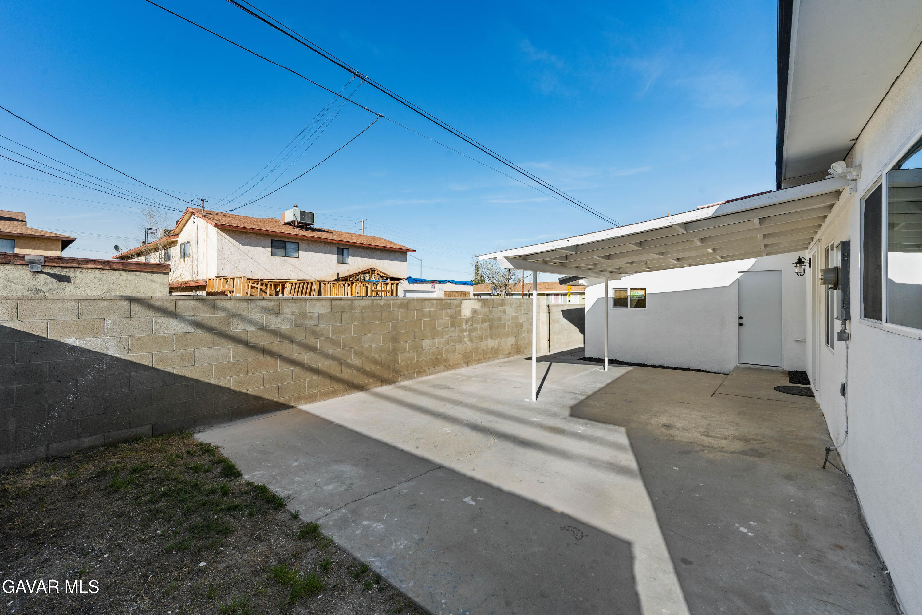 44745 3rd Street East Lancaster, CA 93535 - Photo 10 of 30 a view of a backyard with sitting area
