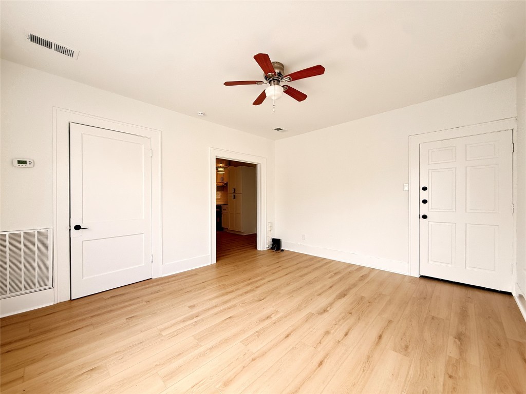 1201 West Gray Street, Unit 3 Houston, TX 77019 - Photo 2 of 10 a view of empty room with wooden floor