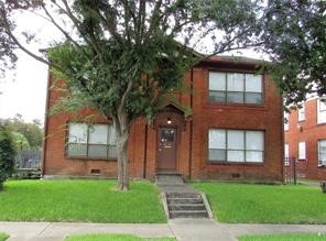 1201 West Gray Street, Unit 3 Houston, TX 77019 - Photo 9 of 10 a front view of a house with a garden