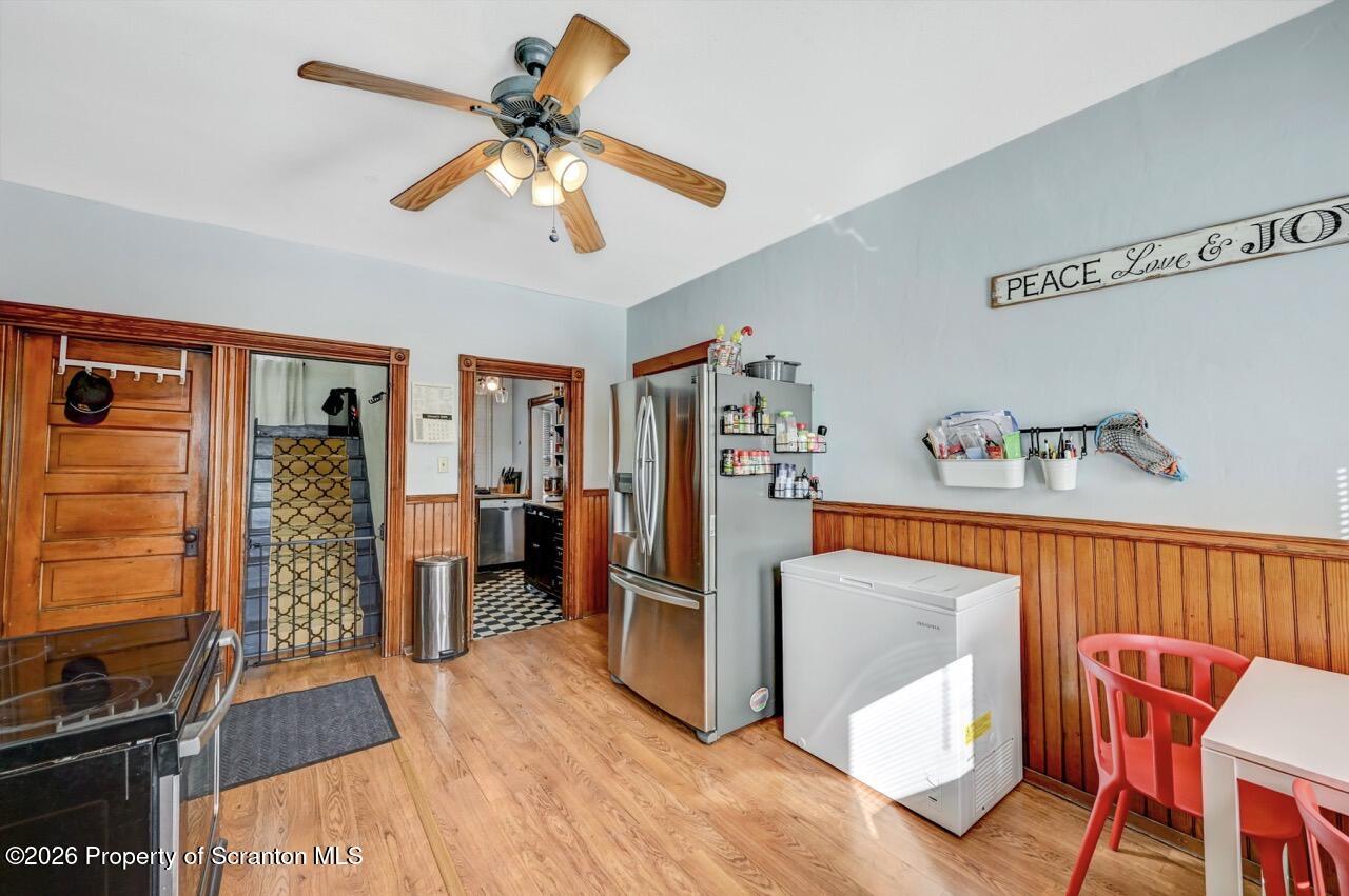 117 West Line Street Olyphant, PA 18447 - Photo 15 of 47 a view of a livingroom with furniture and workspace