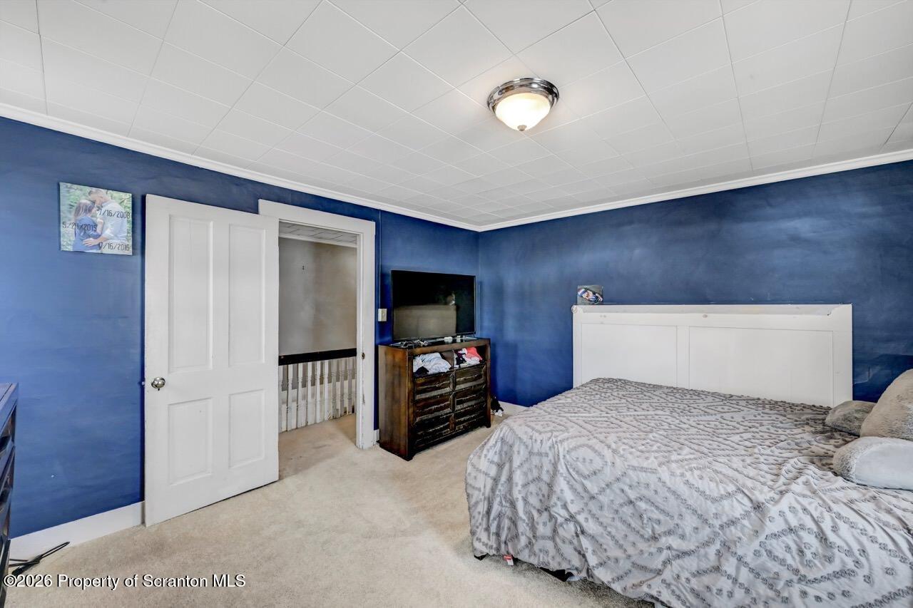 117 West Line Street Olyphant, PA 18447 - Photo 29 of 47 a bedroom with a bed and a television