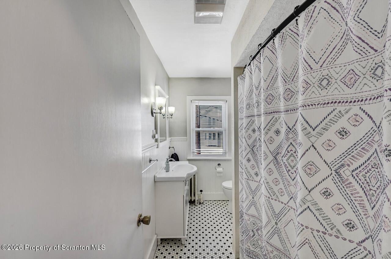 117 West Line Street Olyphant, PA 18447 - Photo 37 of 47 a bathroom with a sink toilet and shower