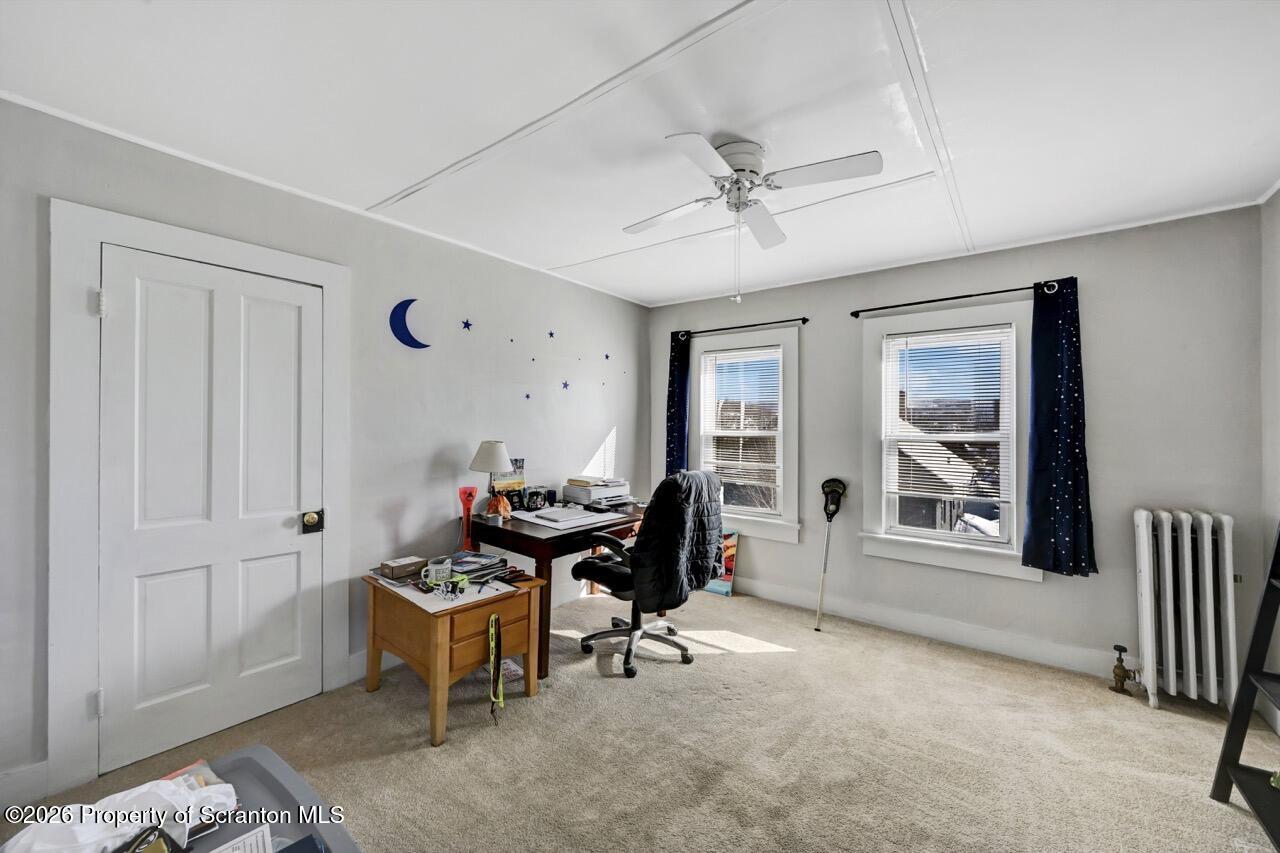 117 West Line Street Olyphant, PA 18447 - Photo 40 of 47 a living room with furniture and a window