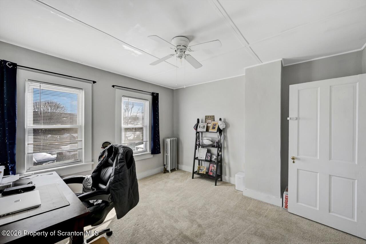 117 West Line Street Olyphant, PA 18447 - Photo 41 of 47 a view of a workspace with furniture and a window