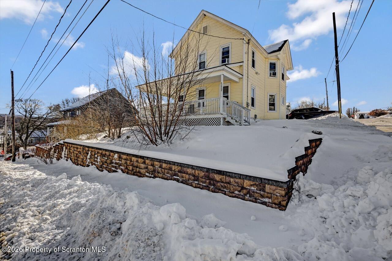 117 West Line Street Olyphant, PA 18447 - Photo 44 of 47 a view of a street with wooden fence