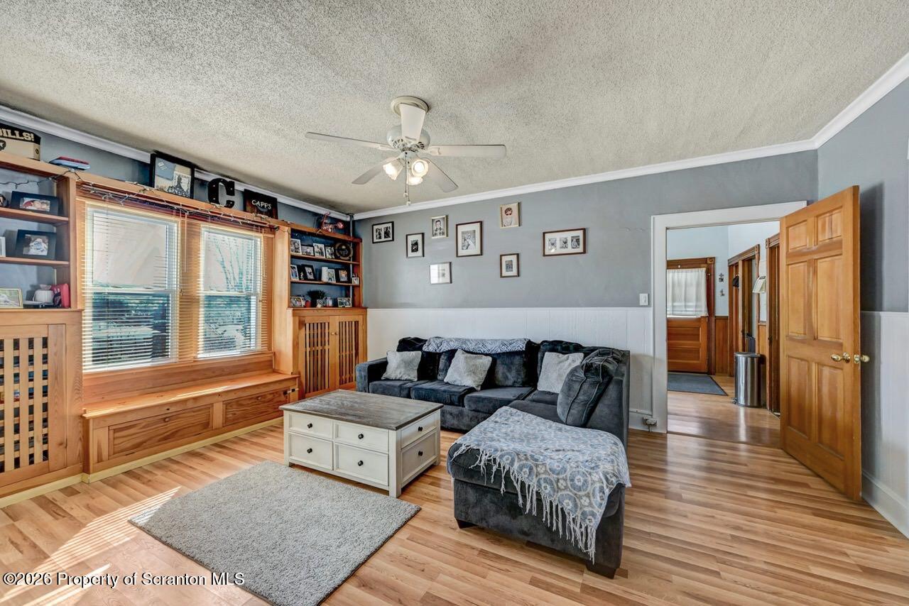 117 West Line Street Olyphant, PA 18447 - Photo 7 of 47 a living room with furniture and a window