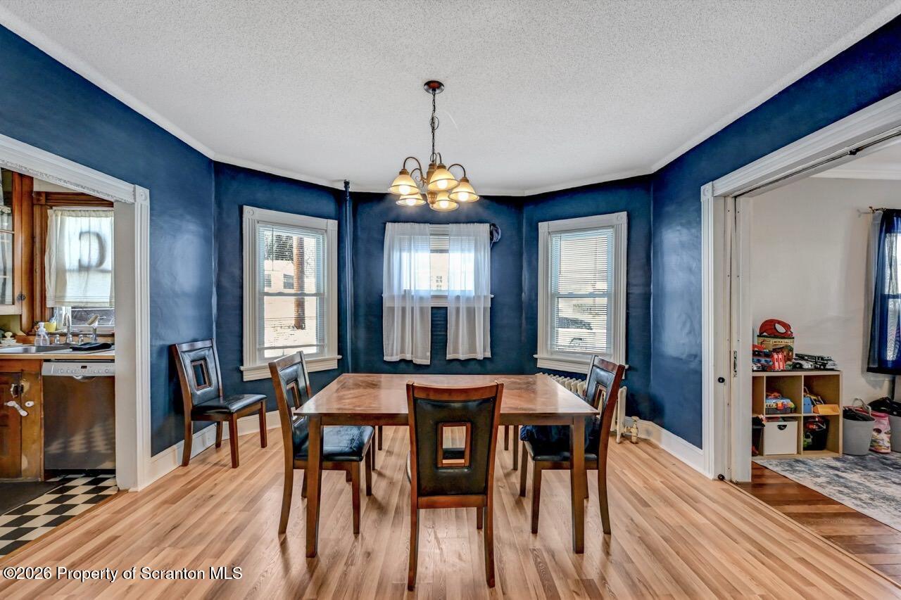 117 West Line Street Olyphant, PA 18447 - Photo 10 of 47 a dining room with furniture window and wooden floor