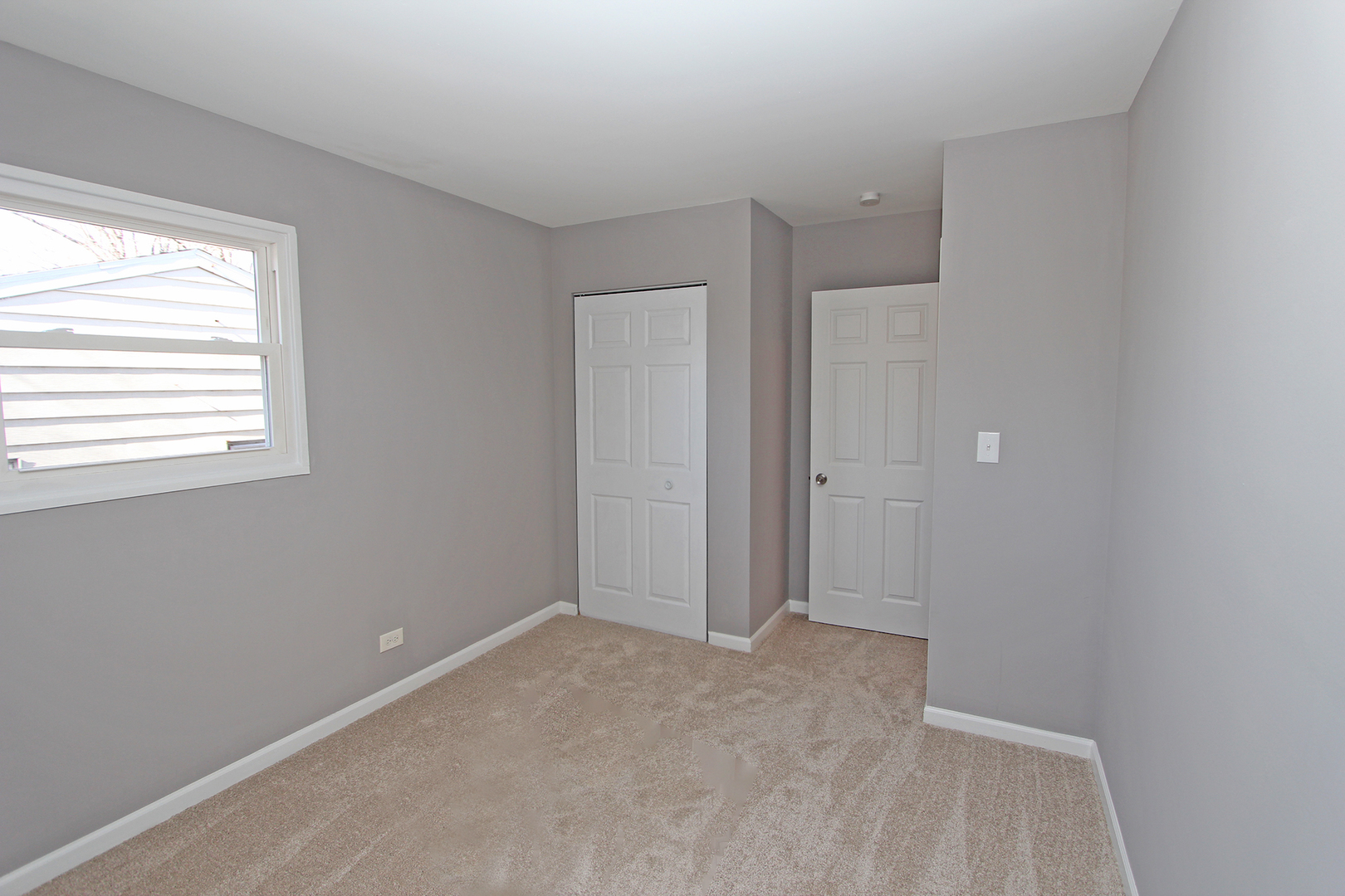 656 Briar Road Wauconda, IL 60084 - Photo 17 of 25 a view of an empty room with a window