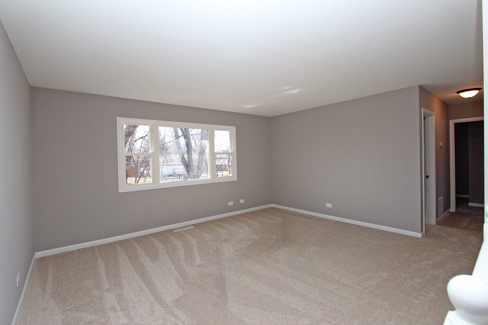 656 Briar Road Wauconda, IL 60084 - Photo 8 of 25 a view of an empty room with a window