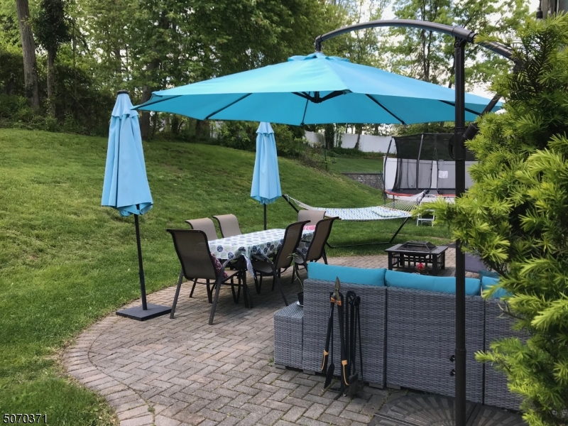 18 Parrott Mill Road Chatham, NJ 07928 - Photo 19 of 19 a view of outdoor space yard deck patio and outdoor kitchen