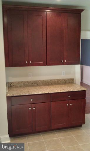 6217 York Road Baltimore, MD 21212 - Photo 7 of 20 a bathroom with a sink and cabinets
