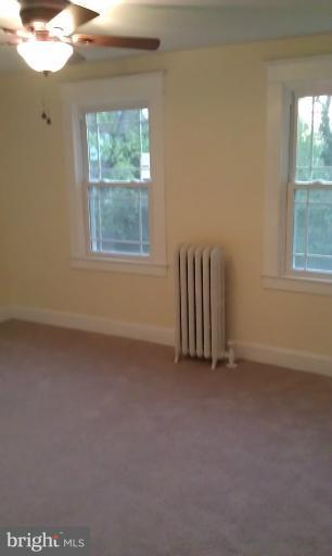 6217 York Road Baltimore, MD 21212 - Photo 8 of 20 an empty room with windows