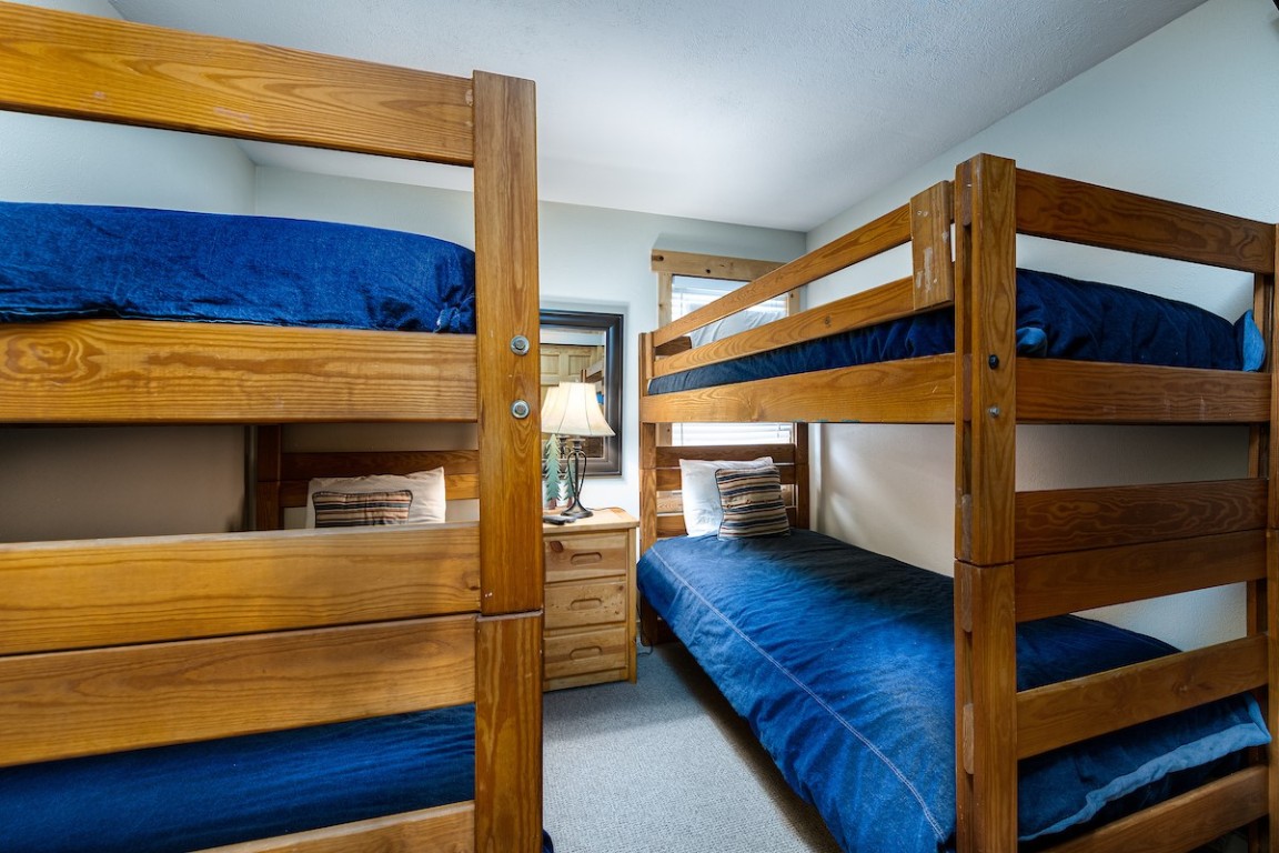 500 4 O Clock Road, Unit A22 Breckenridge, CO 80424 - Photo 12 of 16 a view of front door and bedroom