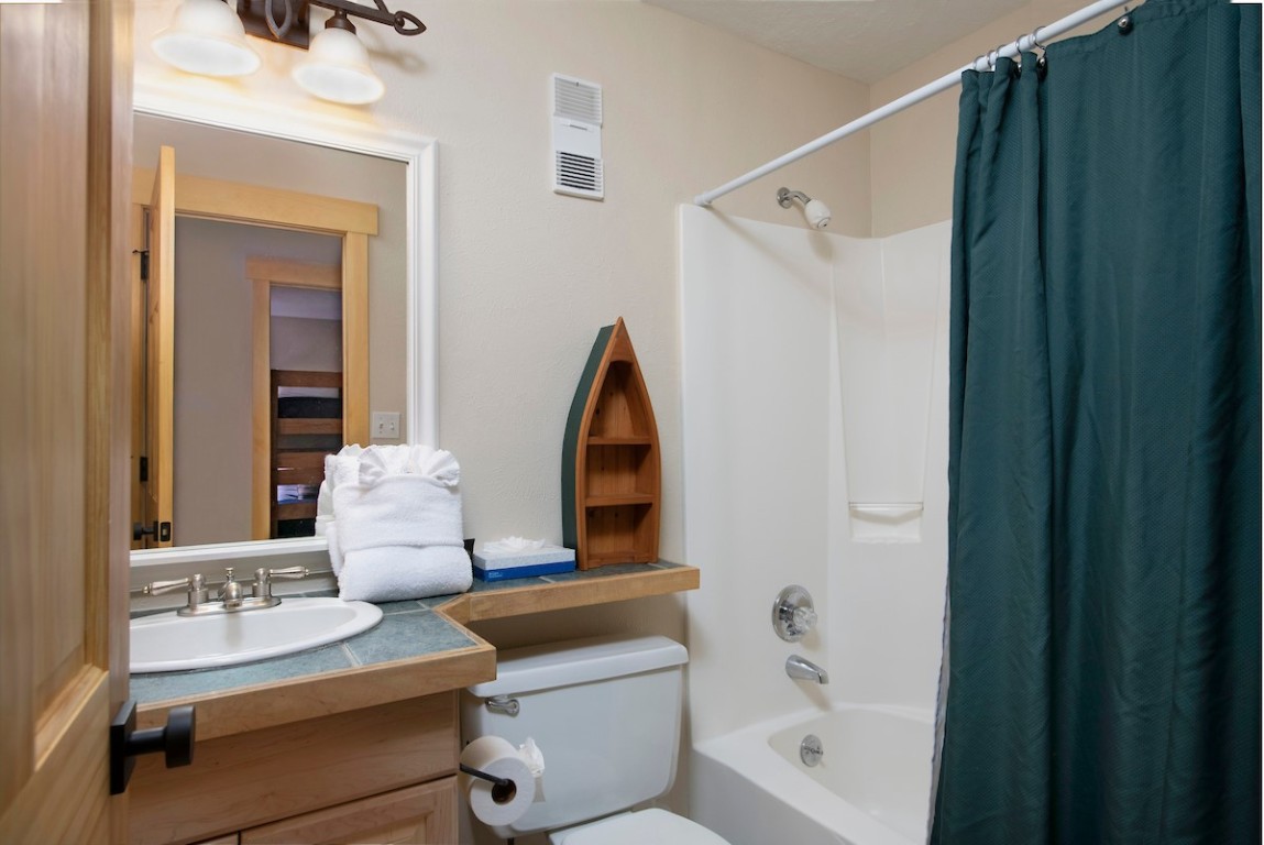 500 4 O Clock Road, Unit A22 Breckenridge, CO 80424 - Photo 16 of 16 a living room with furniture and a window