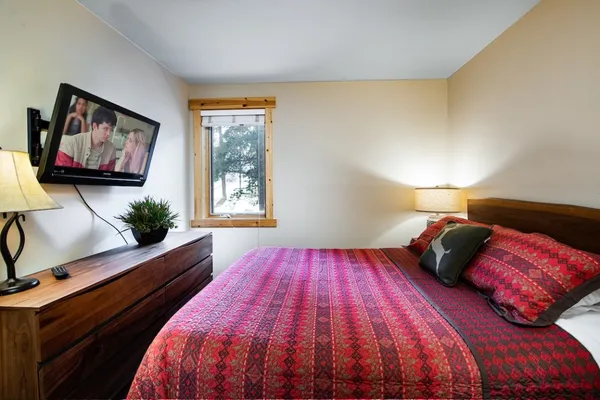 a view of front door and bedroom