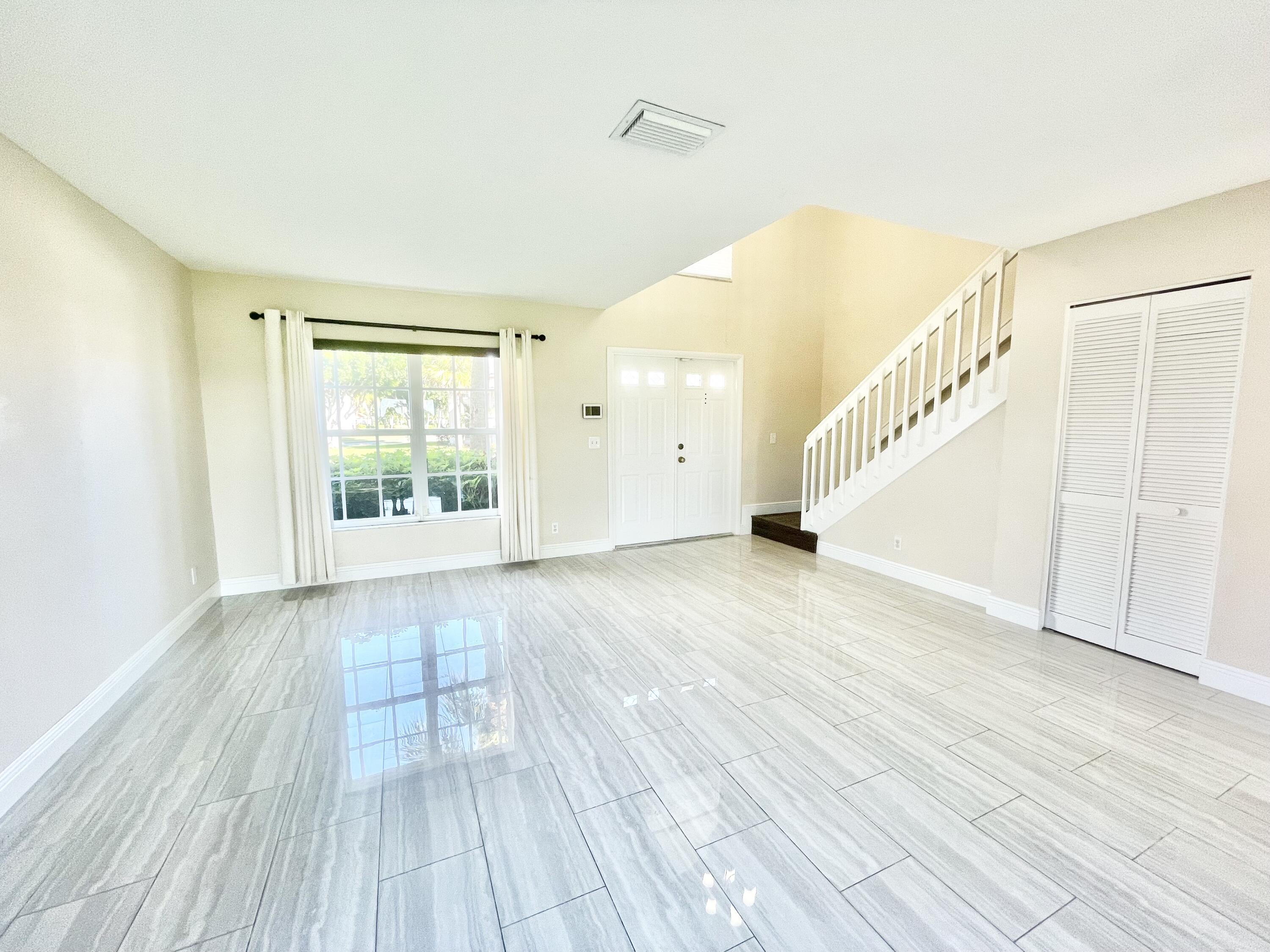 10779 Buttonwood Lake Drive Boca Raton, FL 33498 - Photo 17 of 35 Front Entryway leading into Living Space