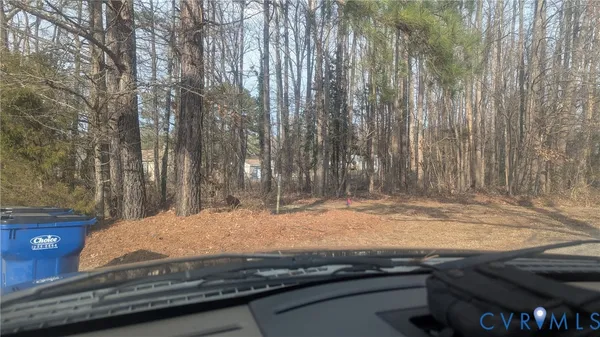 a bathroom with a granite countertop window and a sink
